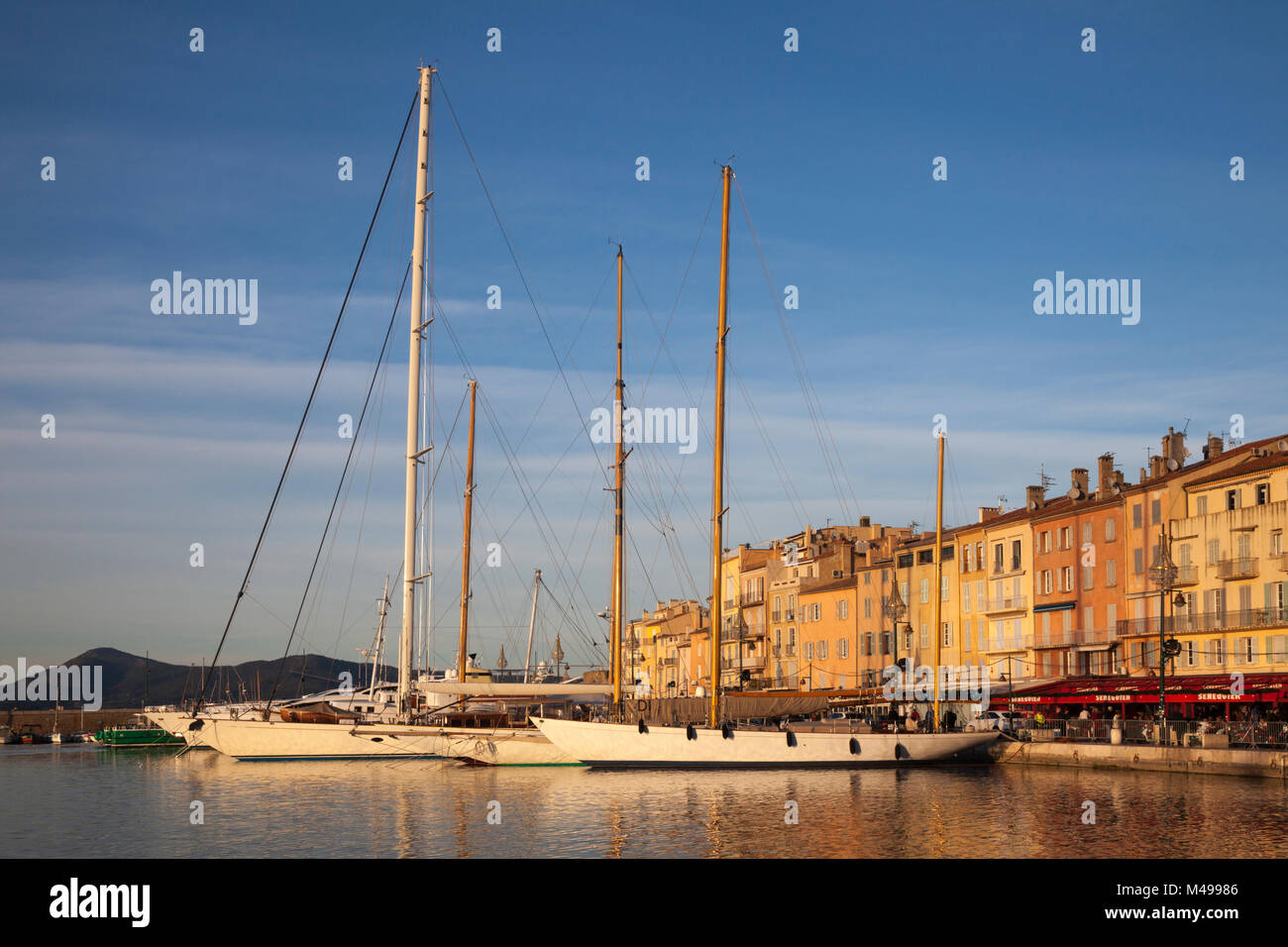 Yaghts and old houses at the port of Saint-Tropez. Location: Var ...