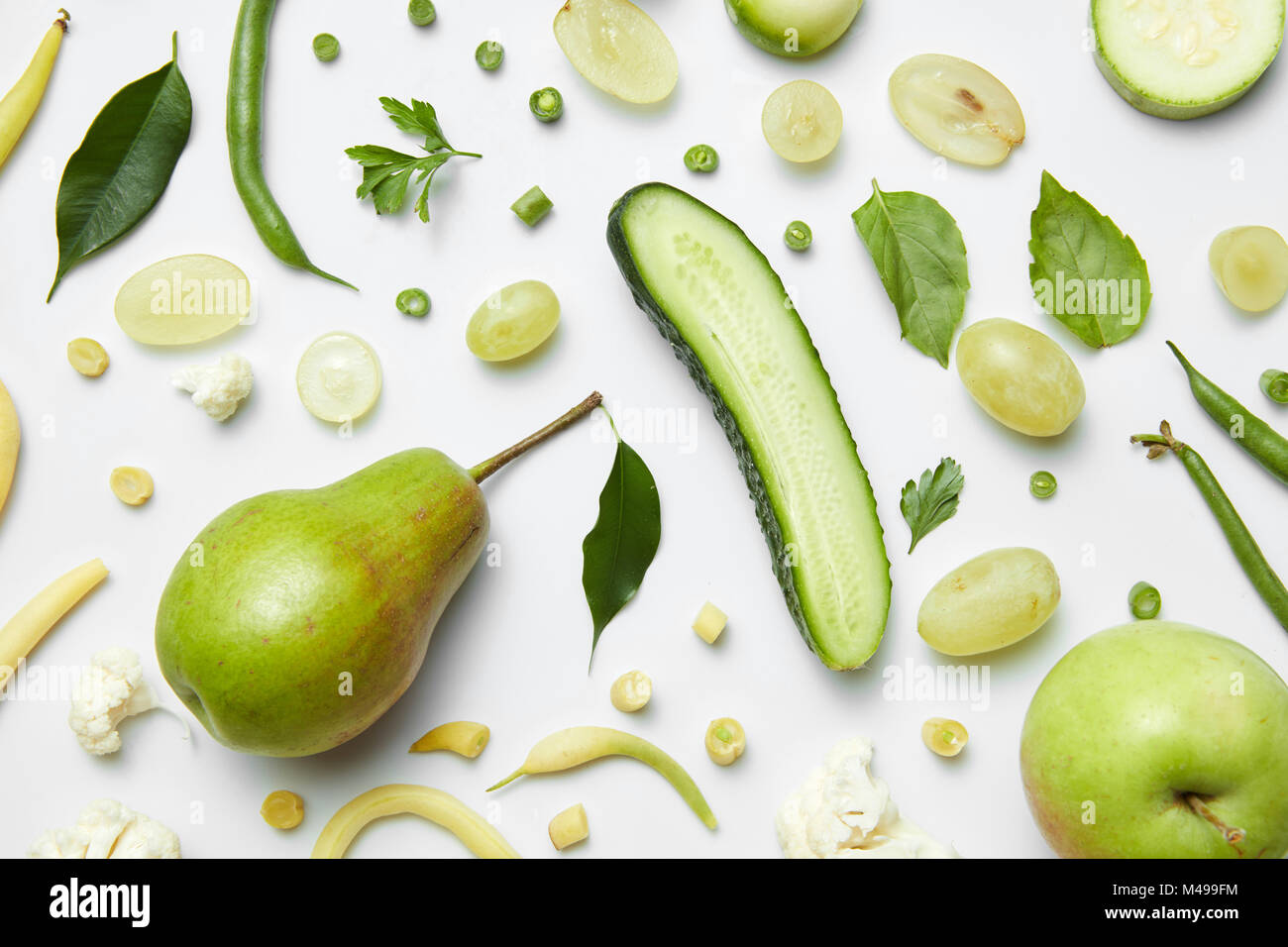 Composition with fresh vegetables and fruits on a white background Stock Photo