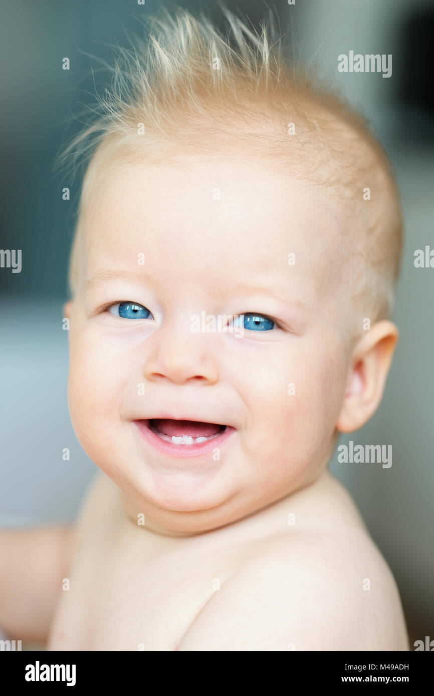 Baby boy with blue eyes Stock Photo Alamy