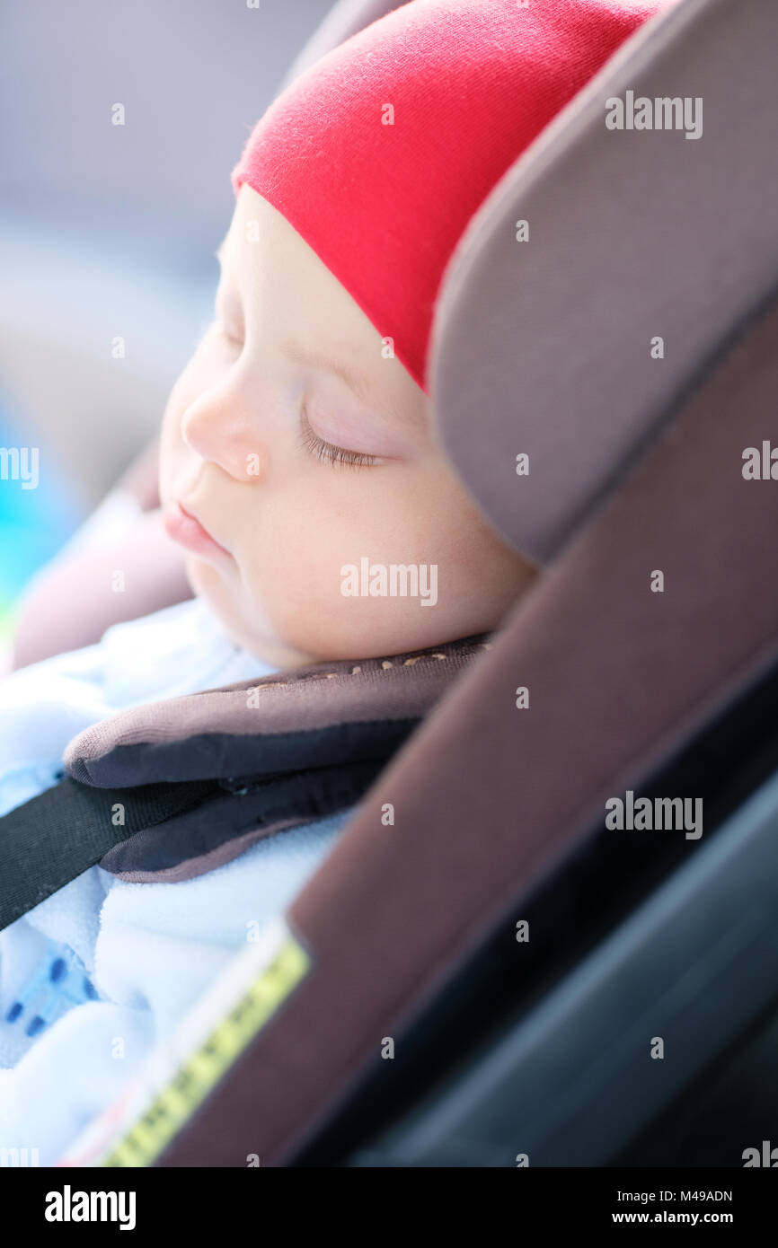 Baby sleeping in car seat Stock Photo Alamy