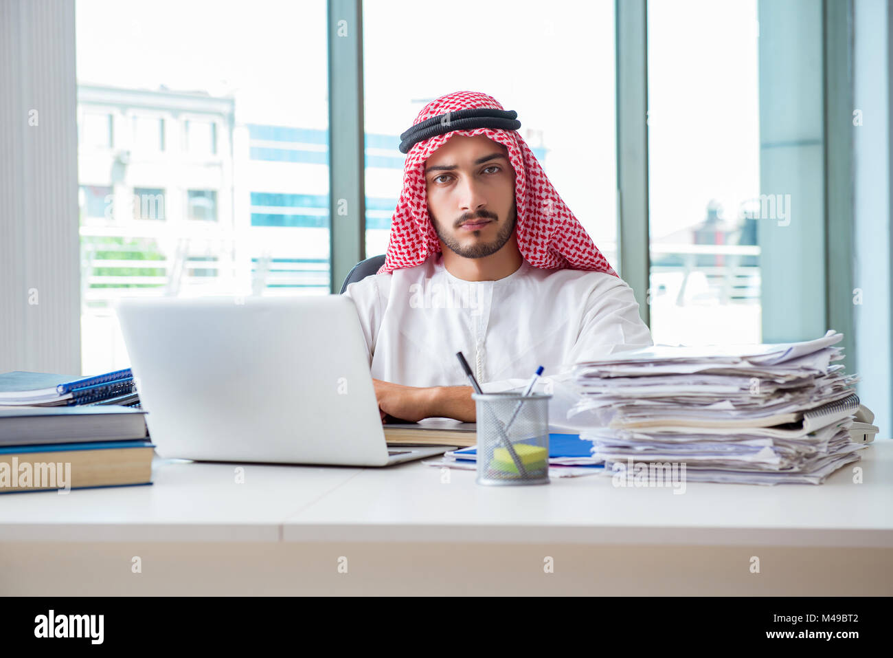 Arab businessman working in the office Stock Photo - Alamy