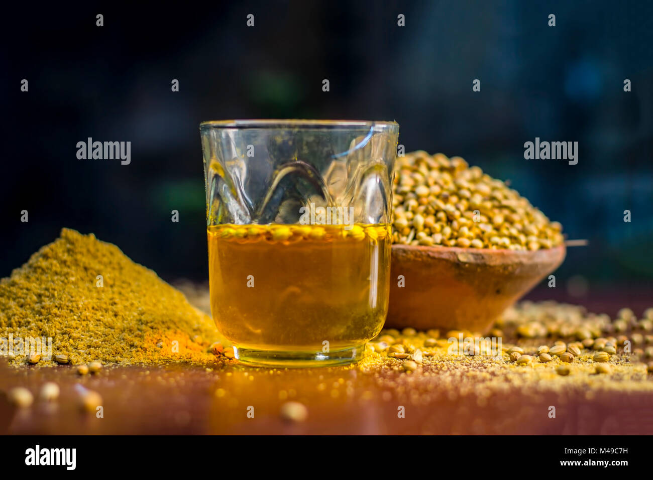 Close up of water of Coriandrum sativum,Coriander with its powder Stock