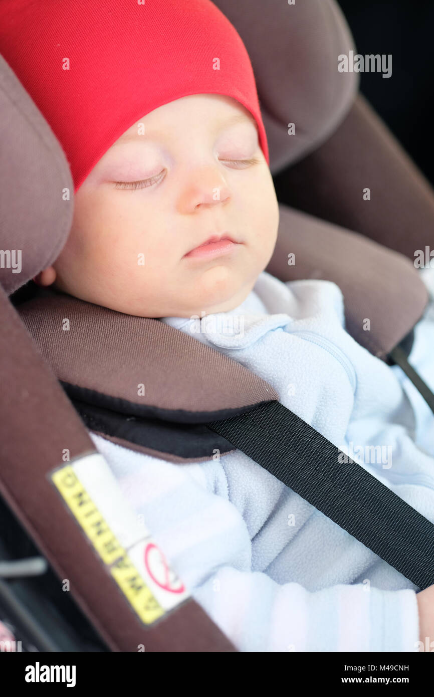 Baby sleeping in car seat Stock Photo Alamy