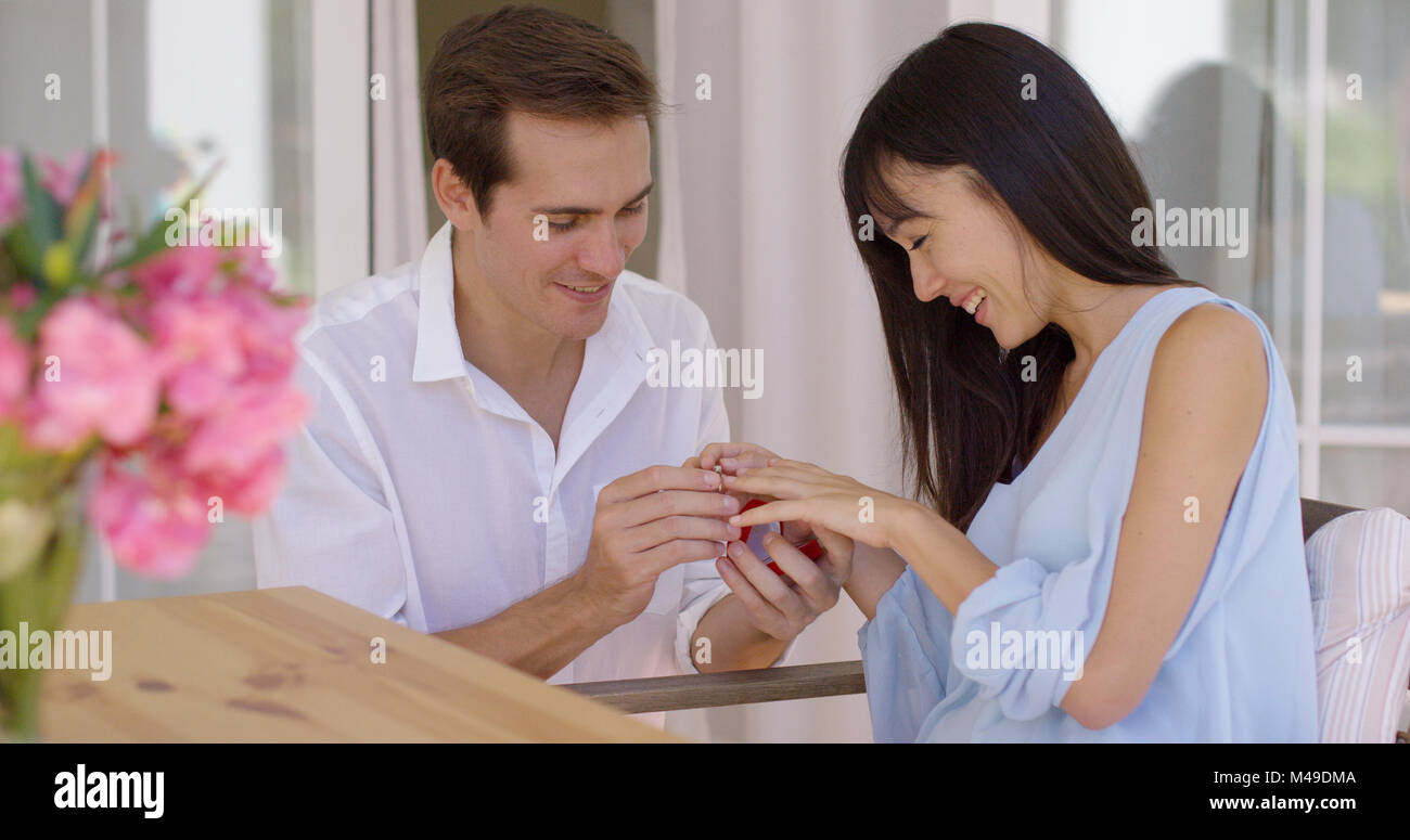 Happy young woman accepting a wedding proposal Stock Photo