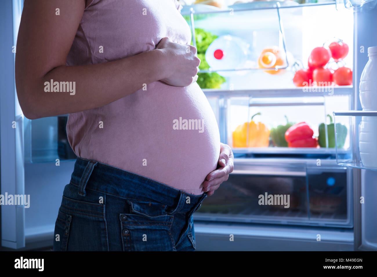 Pregnant woman with open belly hi-res stock photography and images - Alamy