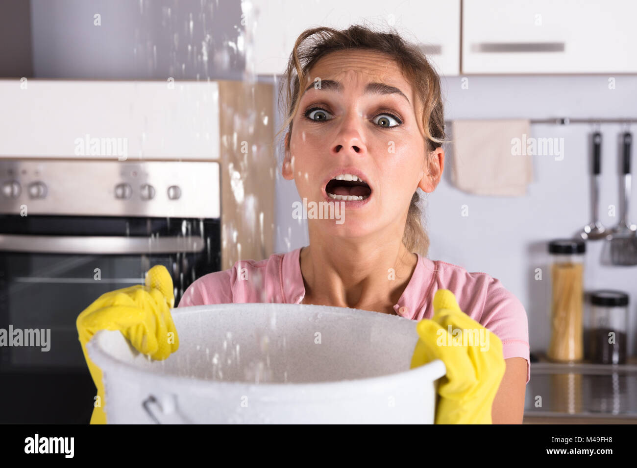 Water bucket home drip hires stock photography and images Alamy