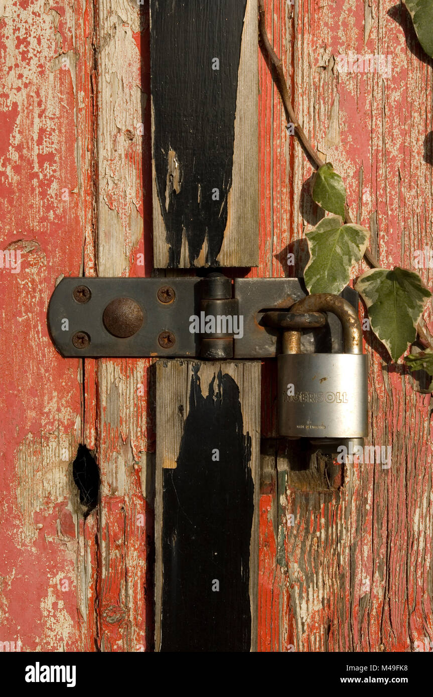 Wooden garage door and padlock Stock Photo Alamy