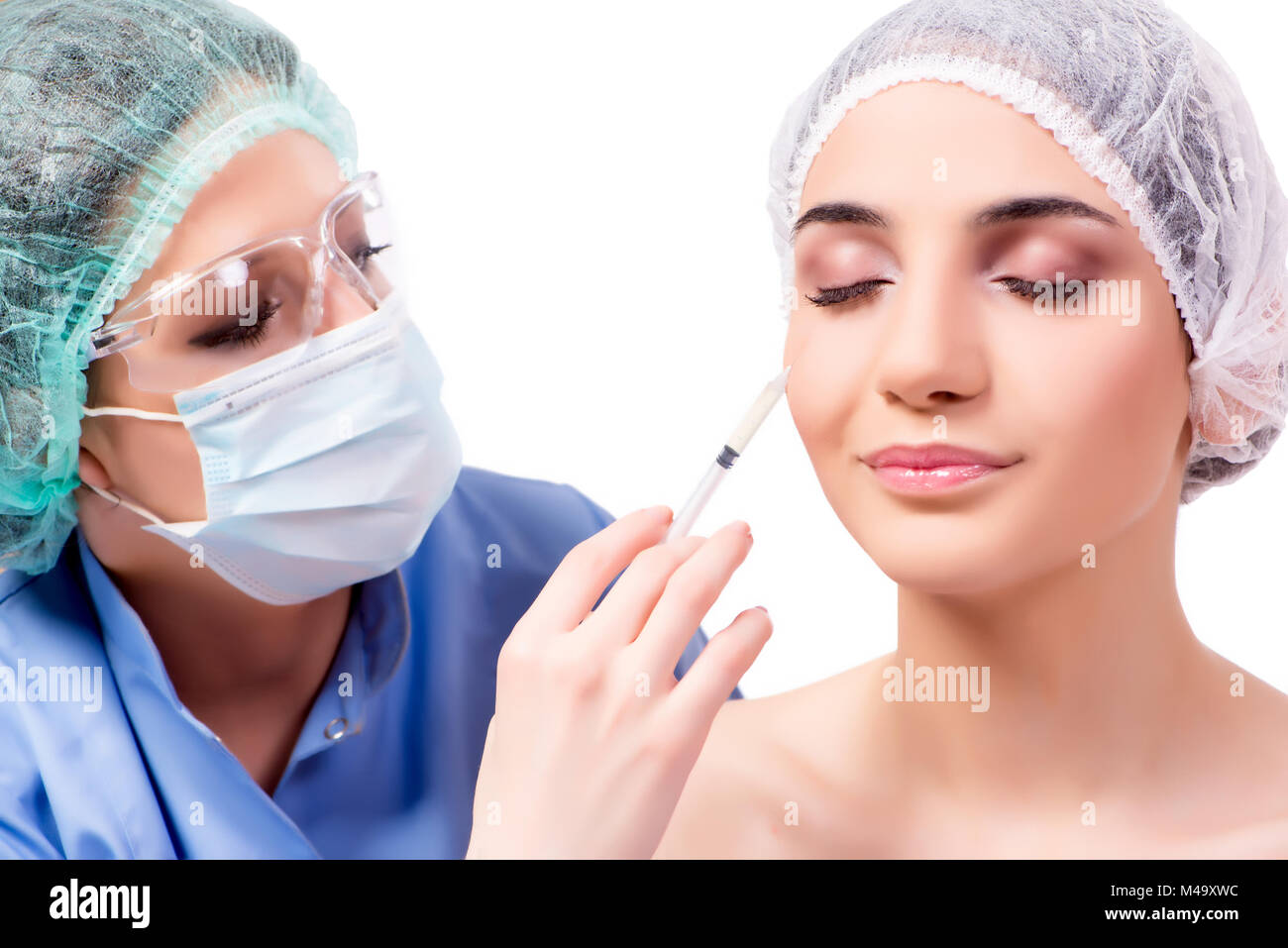 Young woman preparing for plastic surgery isolated on white Stock Photo