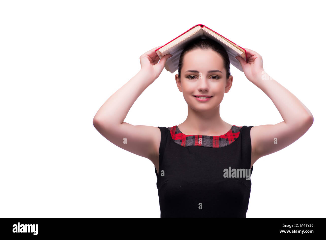 Young female student reading book isolated on white Stock Photo - Alamy