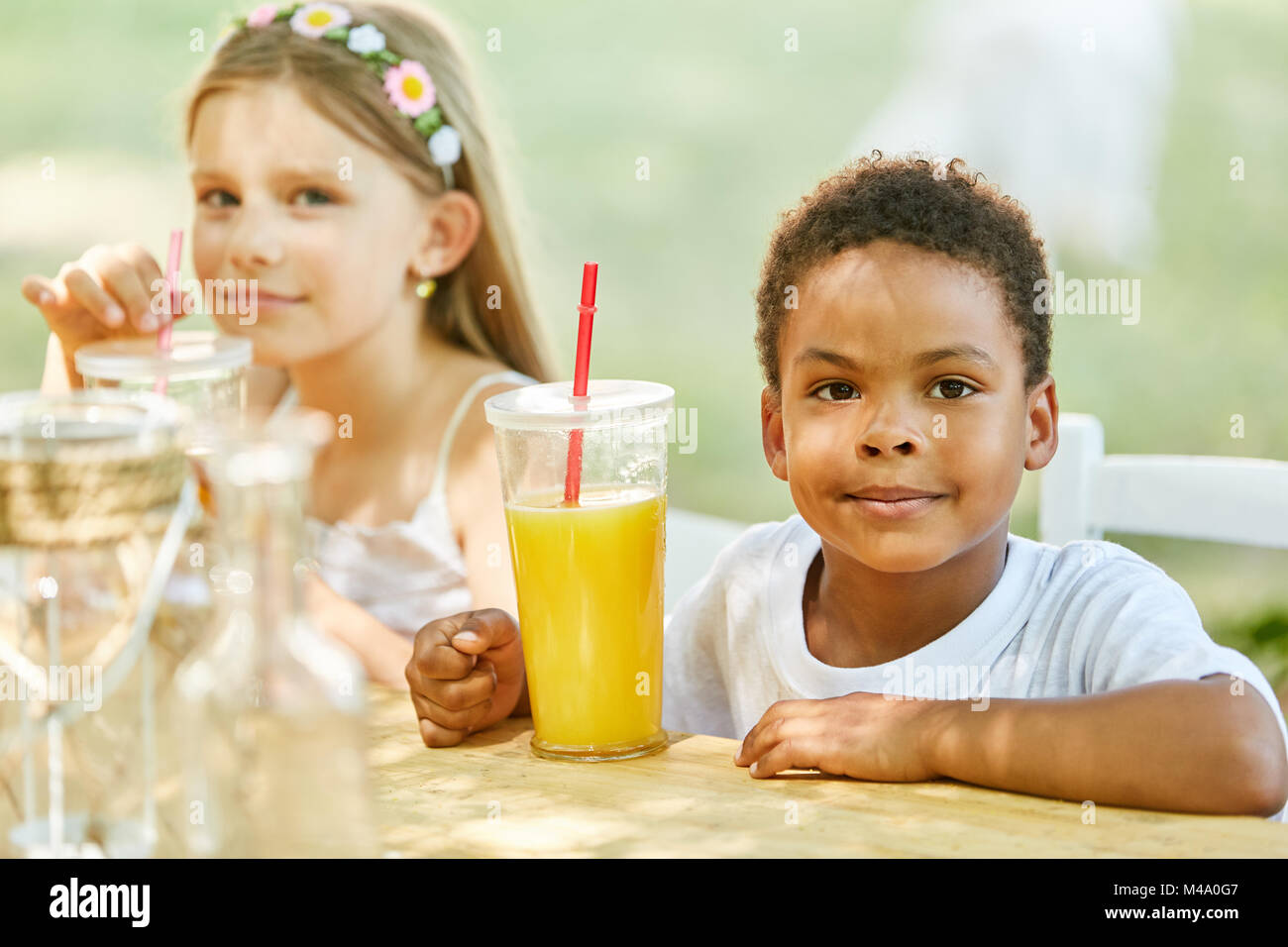 Children drinking orange juice hires stock photography and images Alamy