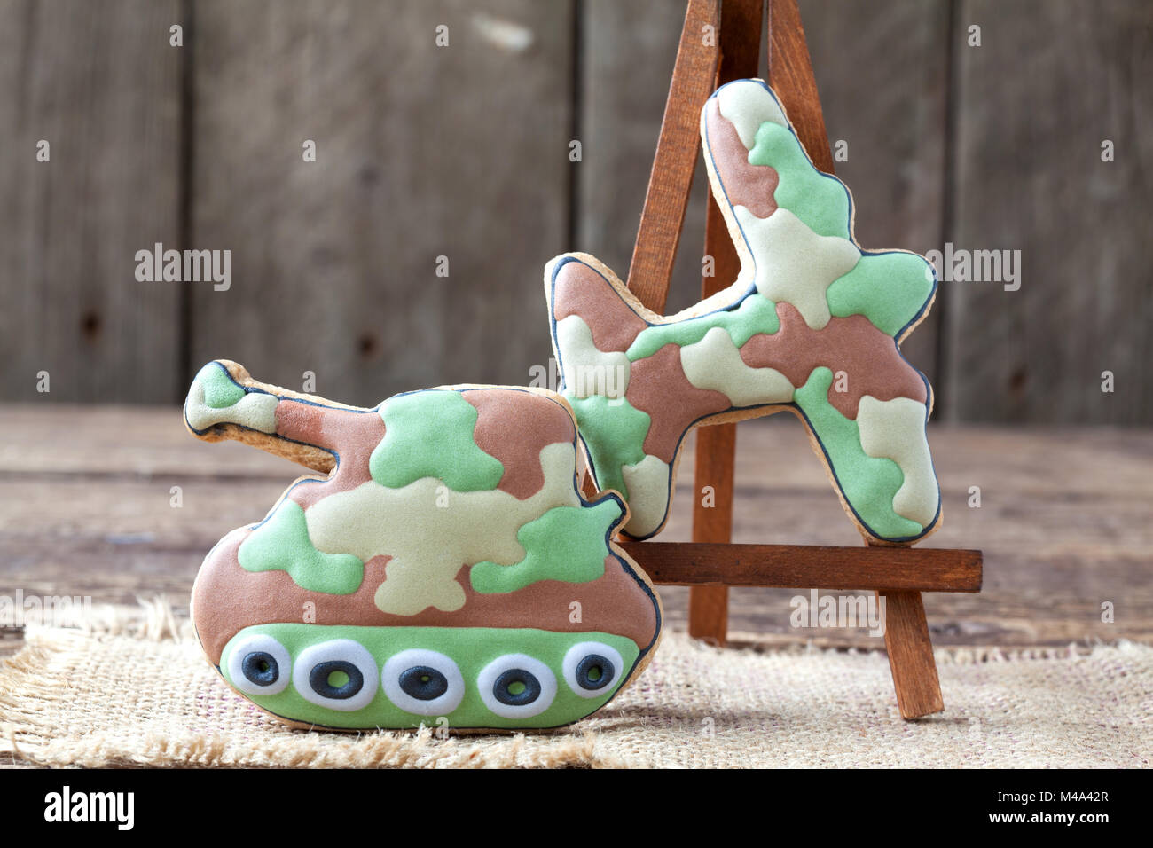 Homemade Gingerbreads in the form of a tank and fighter aircraft in ...