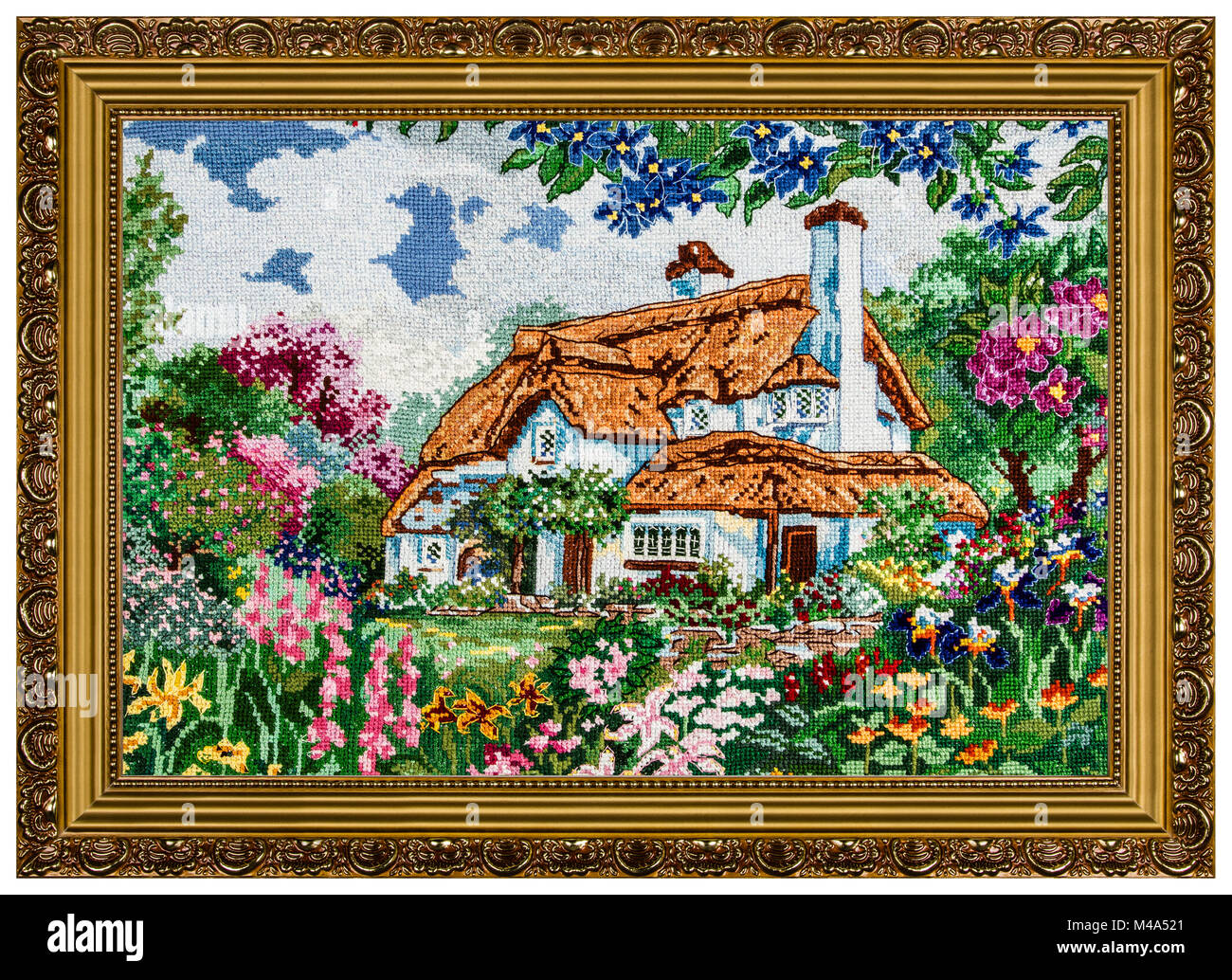 Embroidered picture in the frame, isolated on white background Stock