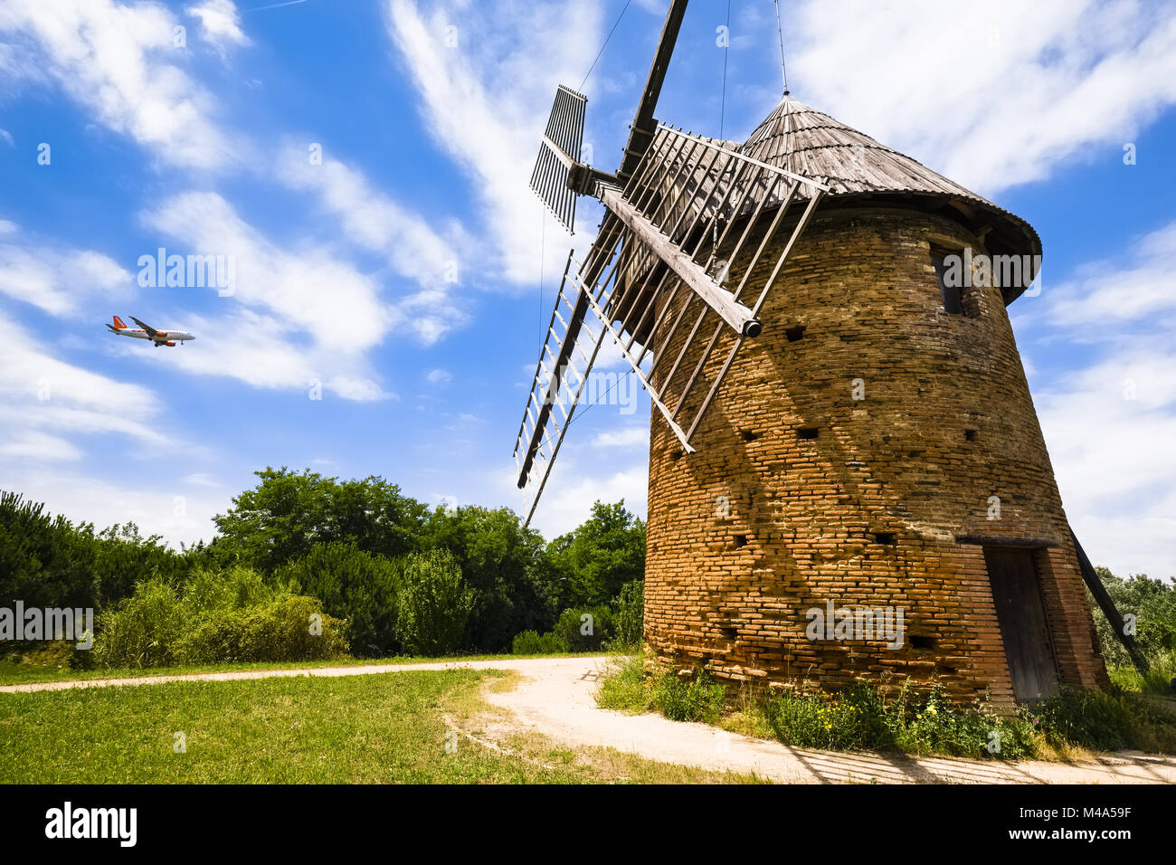 Historic wind mill near airport, Toulouse, France Stock Photo