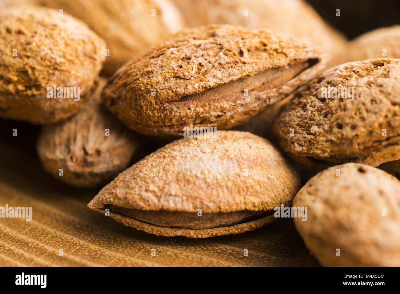 Heap of almond nuts in shell Stock Photo Alamy