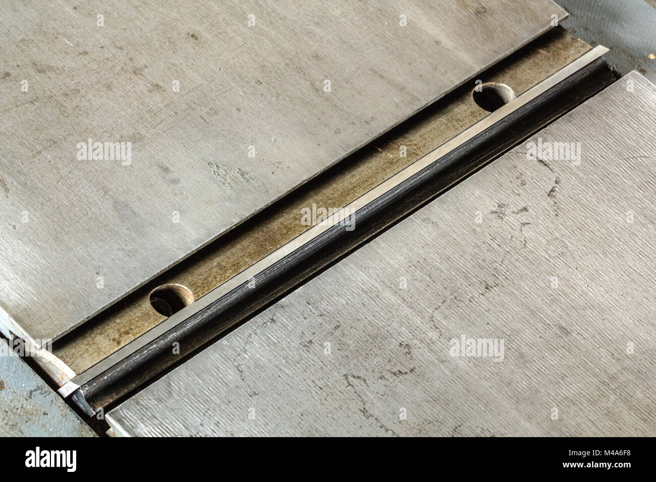 Shaft with sharp knives of woodworking jointer Stock Photo Alamy