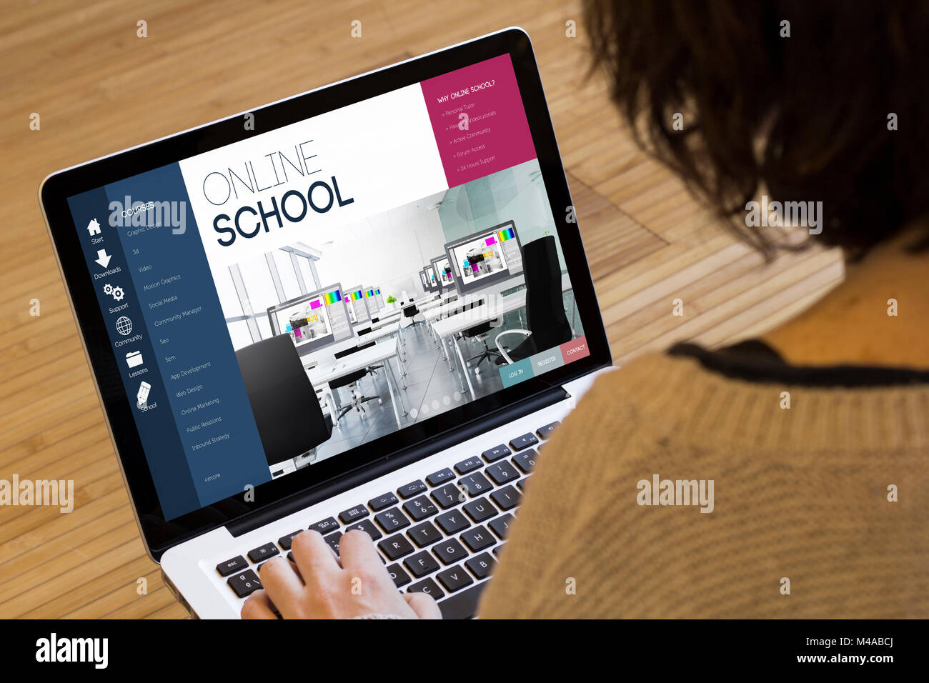 e-learning concept: online school on a laptop screen. Screen graphics are made up. Stock Photo