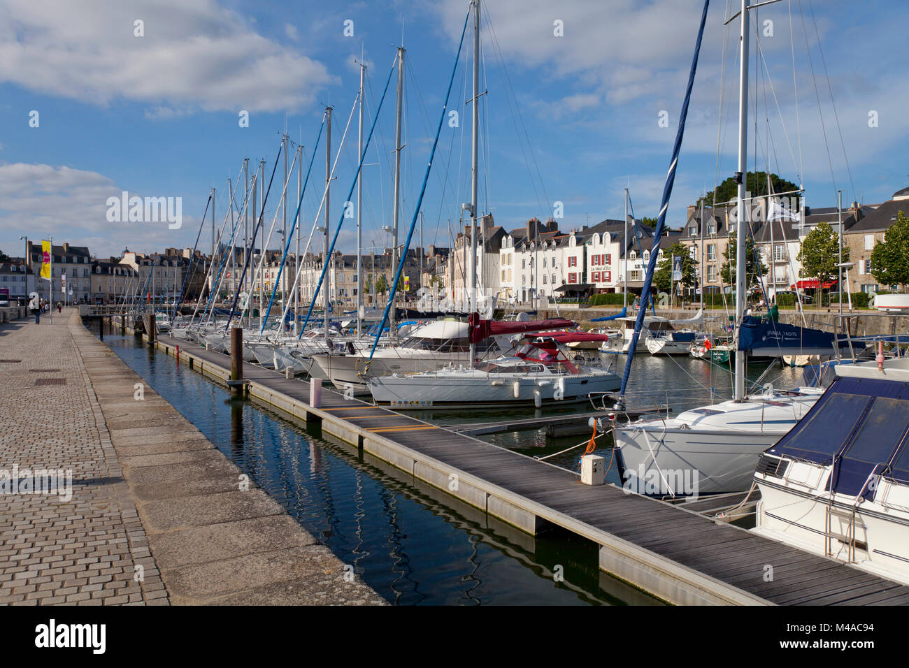 Vannes (Brittany, north-western France): boats moored in the marina and buildings along the harbour. (Not available for postcard production) Stock Photo