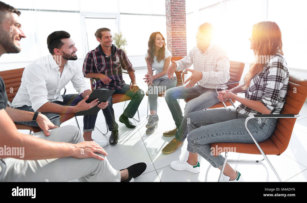 creative team sitting in the lobby of the office Stock Photo - Alamy
