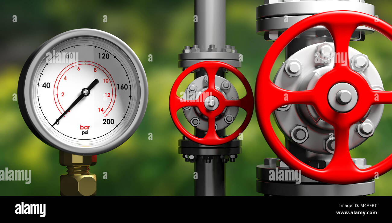 Industrial high pressure gas manometer, pipelines and valves on blur ...