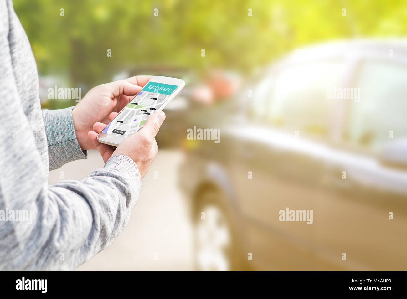 Online ride sharing and carpool mobile application. Rideshare taxi app on smartphone screen. Modern people and commuter transportation service. Stock Photo