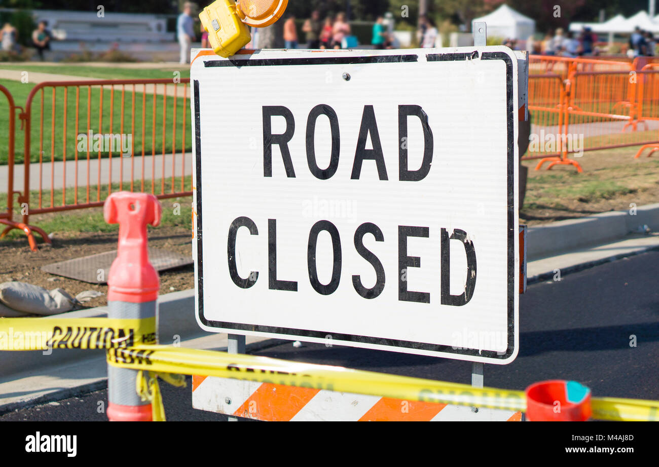 Road closed sign and block in a city street. Stock Photo