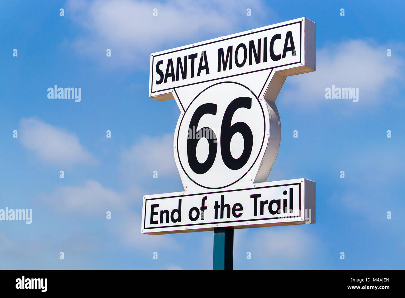 Santa Monica End of the Trail sign against sky. Stock Photo