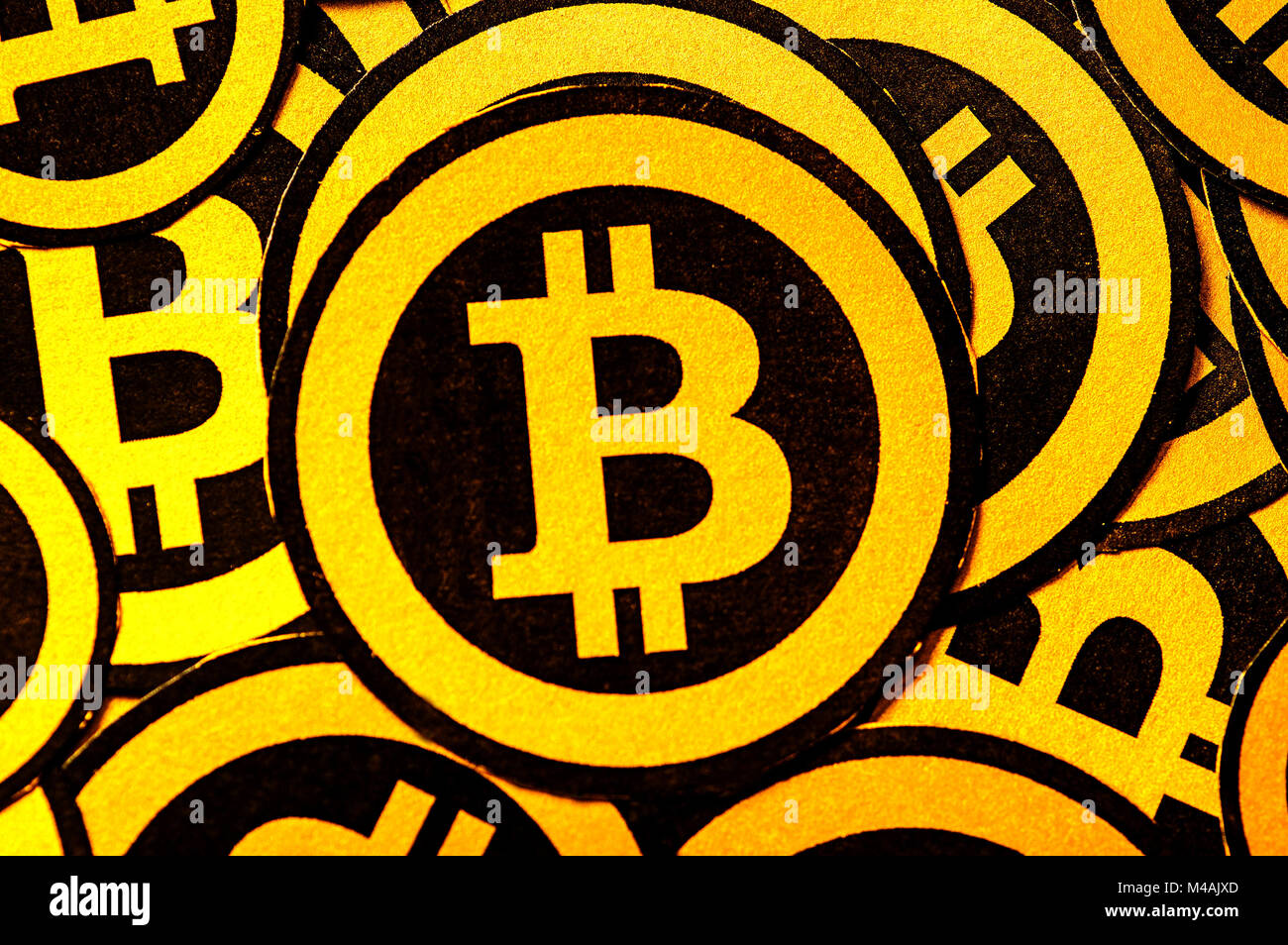 Quito, Ecuador - January 31, 2018: Indoor view of selective focus of Golden  Bitcoin logo. with small bitcoins logos around the big one. Bitcoin  cryptocurrency. Business concept in a black background Stock Photo - Alamy