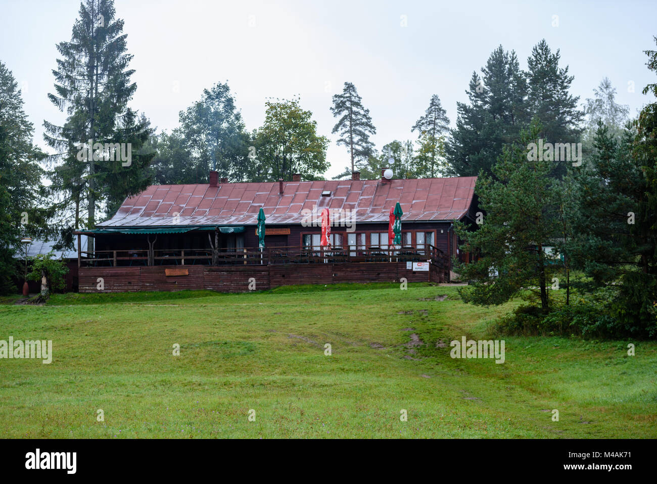 View of country house with trees in green summertime Stock Photo - Alamy