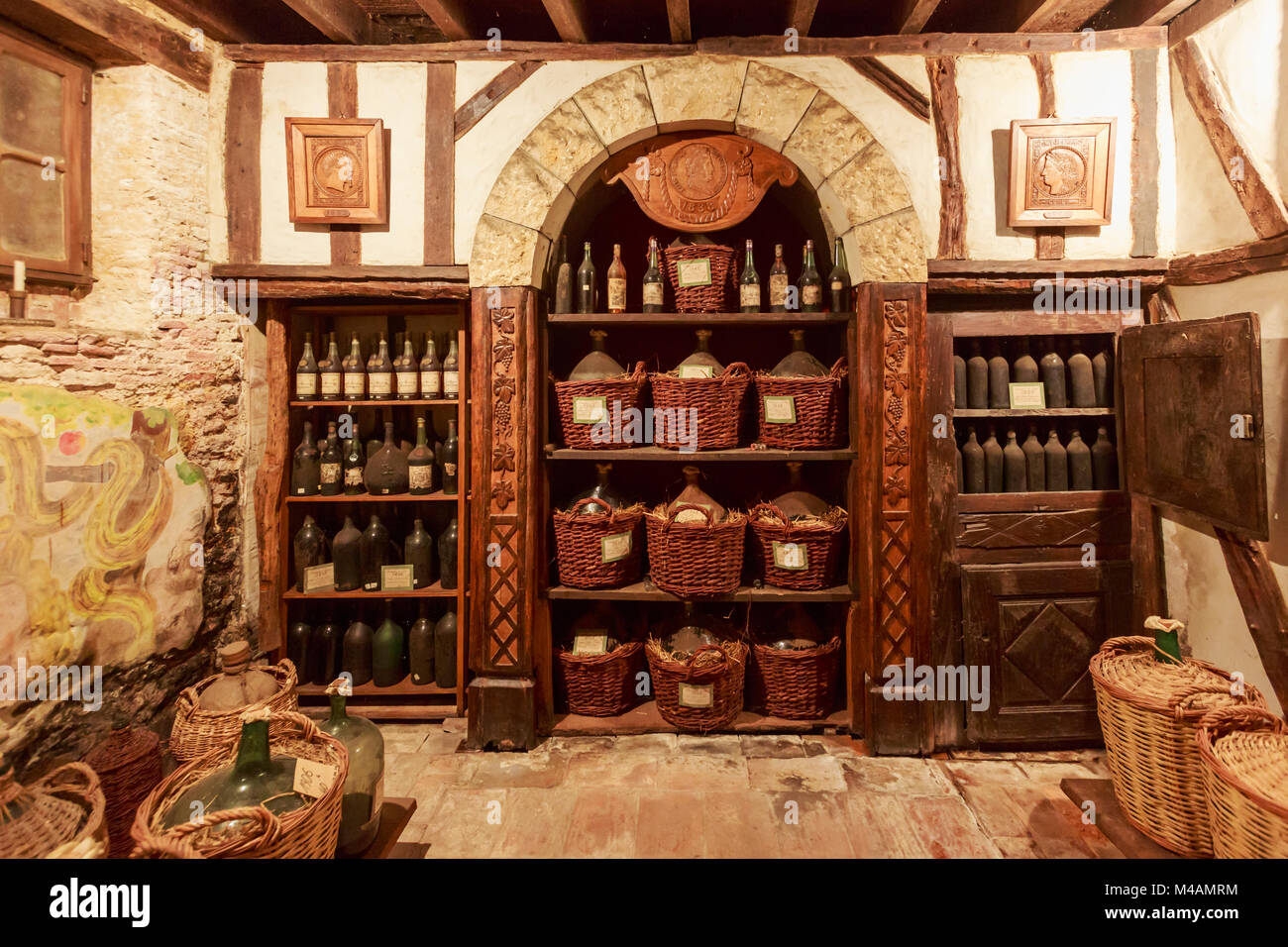 Nogaro, Gers Department, Midi-Pyrénées, France.   Room storing the oldest Armagnacs which have been produced by the cellars of  Dartigalongue & Fils.  Stock Photo