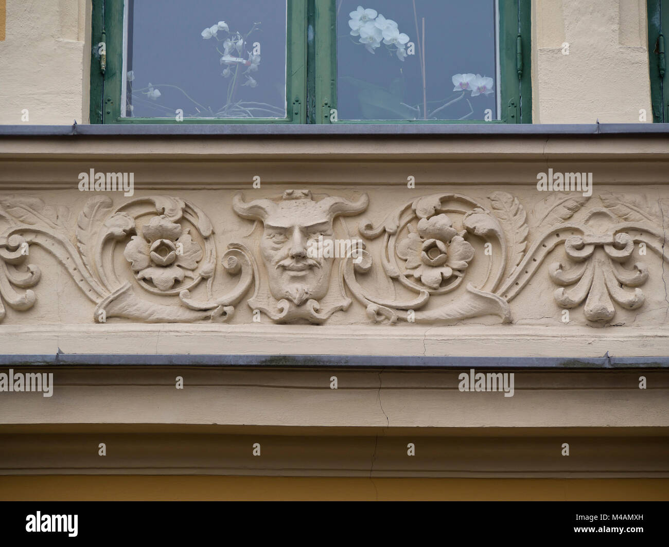 Facade decoration on old apartment block in the St. Hanshaugen district of Oslo Norway, turn of century (ca 1900) building, devils head and acanthus Stock Photo