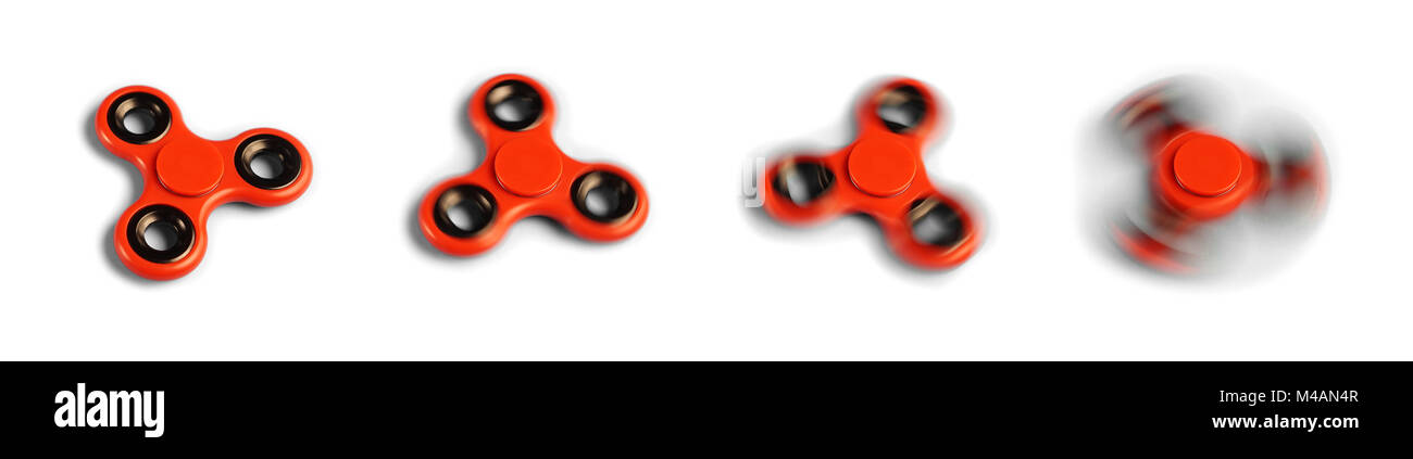 Fidget spinner in different various spinning speeds on white background. Stock Photo