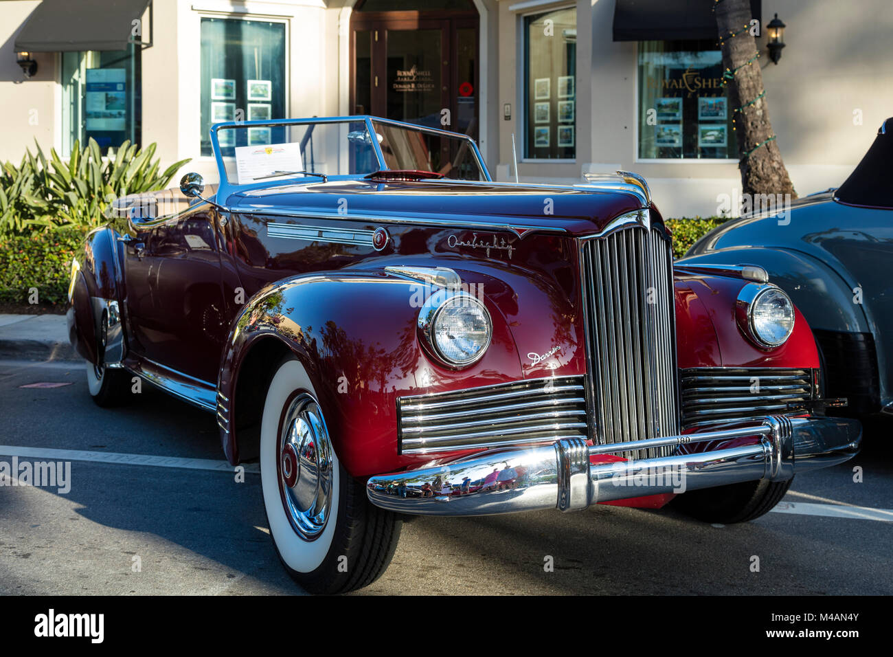 Maroon 1942 Packard 'Darrin' on display at 'Cars on 5th' autoshow, Naples, Florida, USA Stock Photo