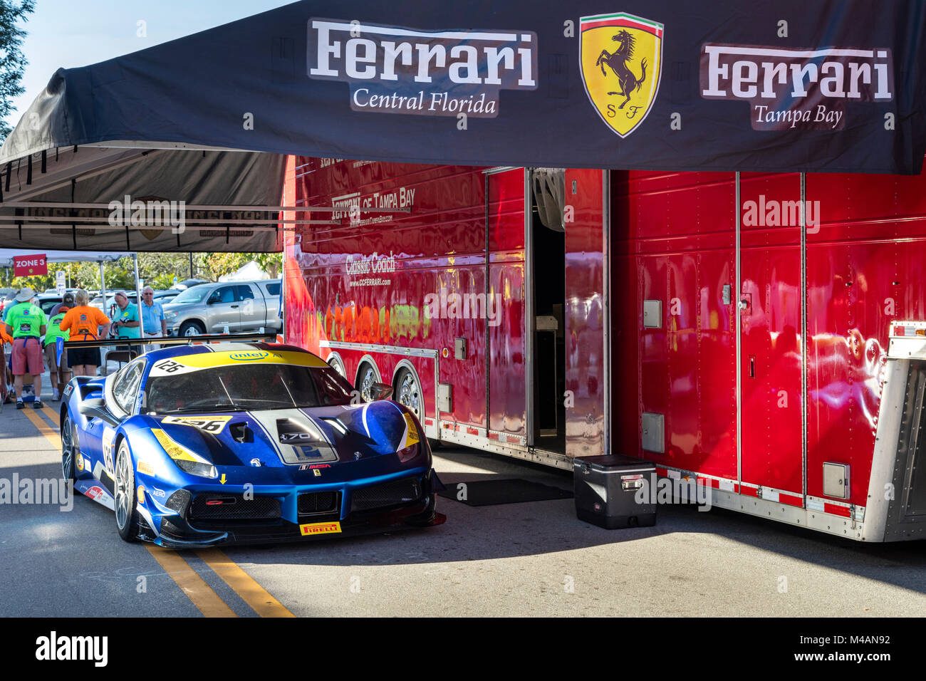 Ferrari Club race car and mobile display at 'Cars on 5th' autoshow, Naples, Florida, USA Stock Photo