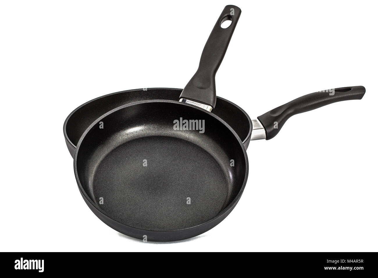 Two frying pans, isolated on white background Stock Photo Alamy