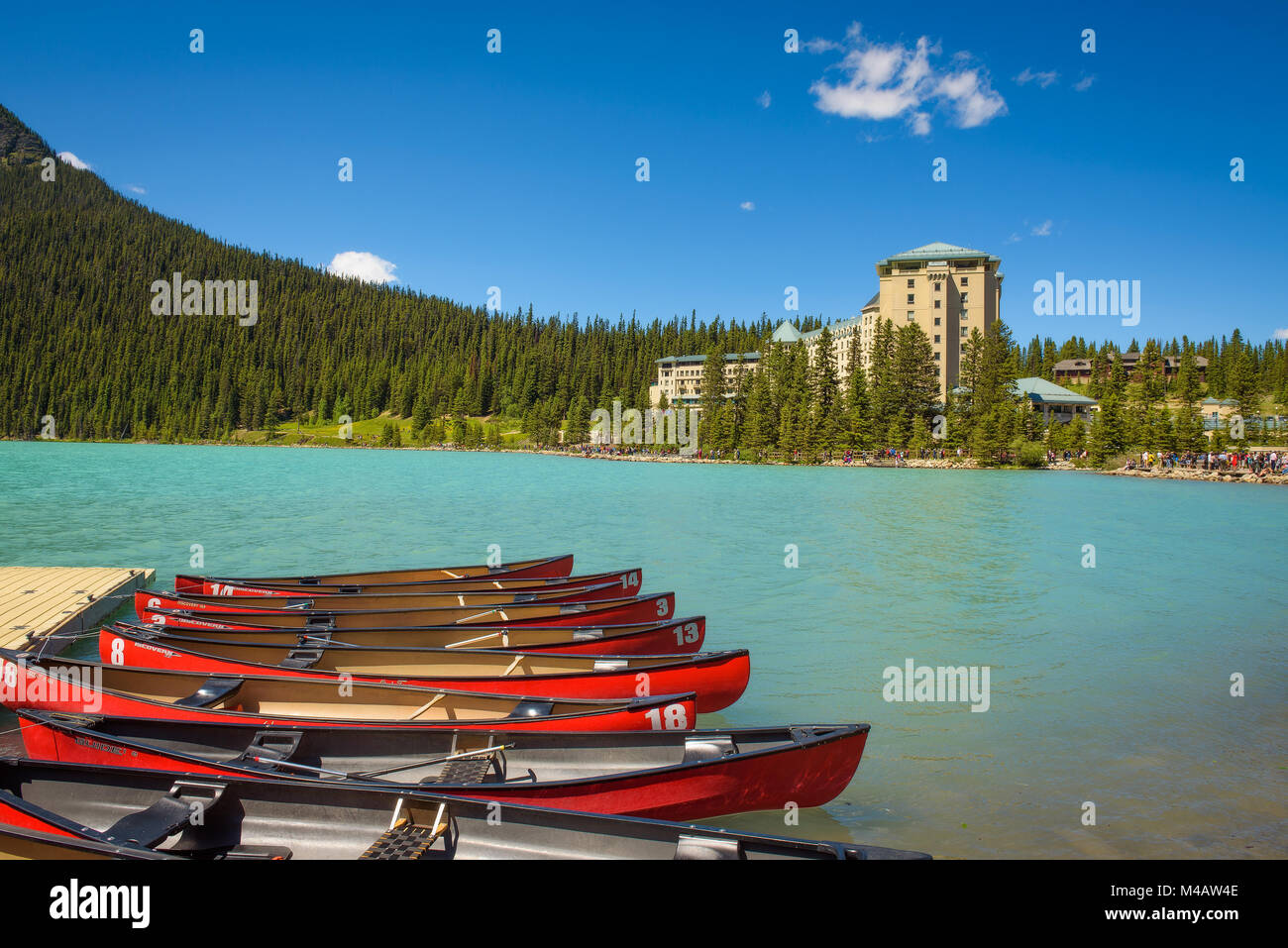 Canoes on a jetty at  Lake Louise in Banff National Park, Canada Stock Photo