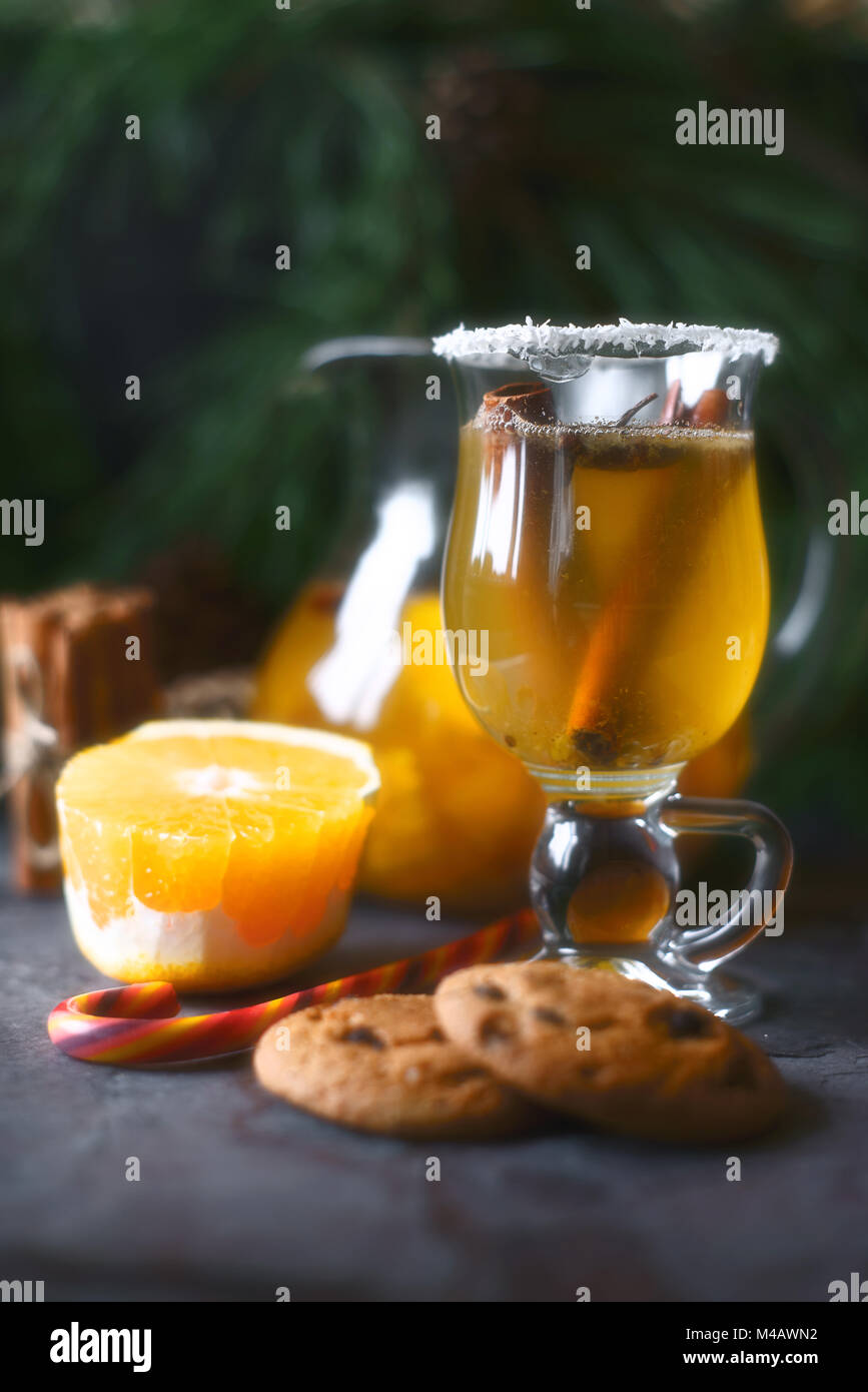 Citrus punch in the glass on the dark table vertical Stock Photo