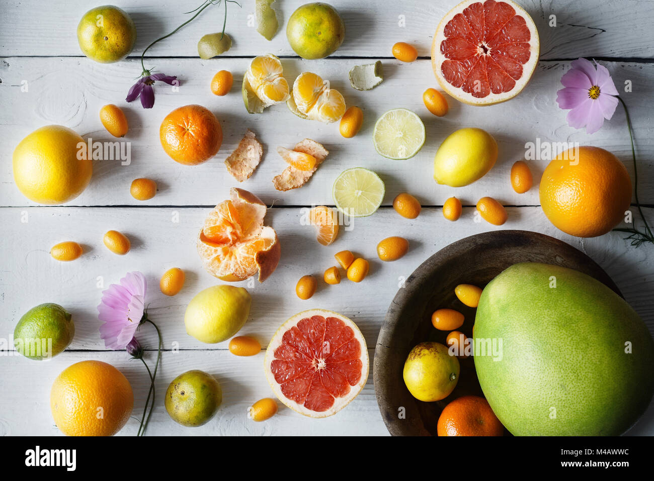 Citrus mix on the white wooden background  top view Stock Photo