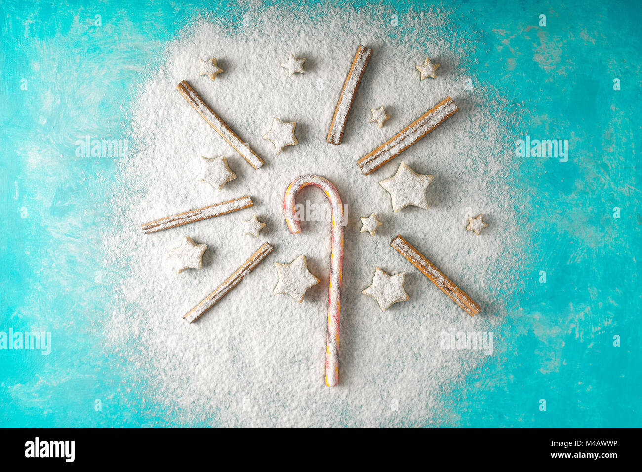 Christmas sweets on the blue snow  background top view Stock Photo