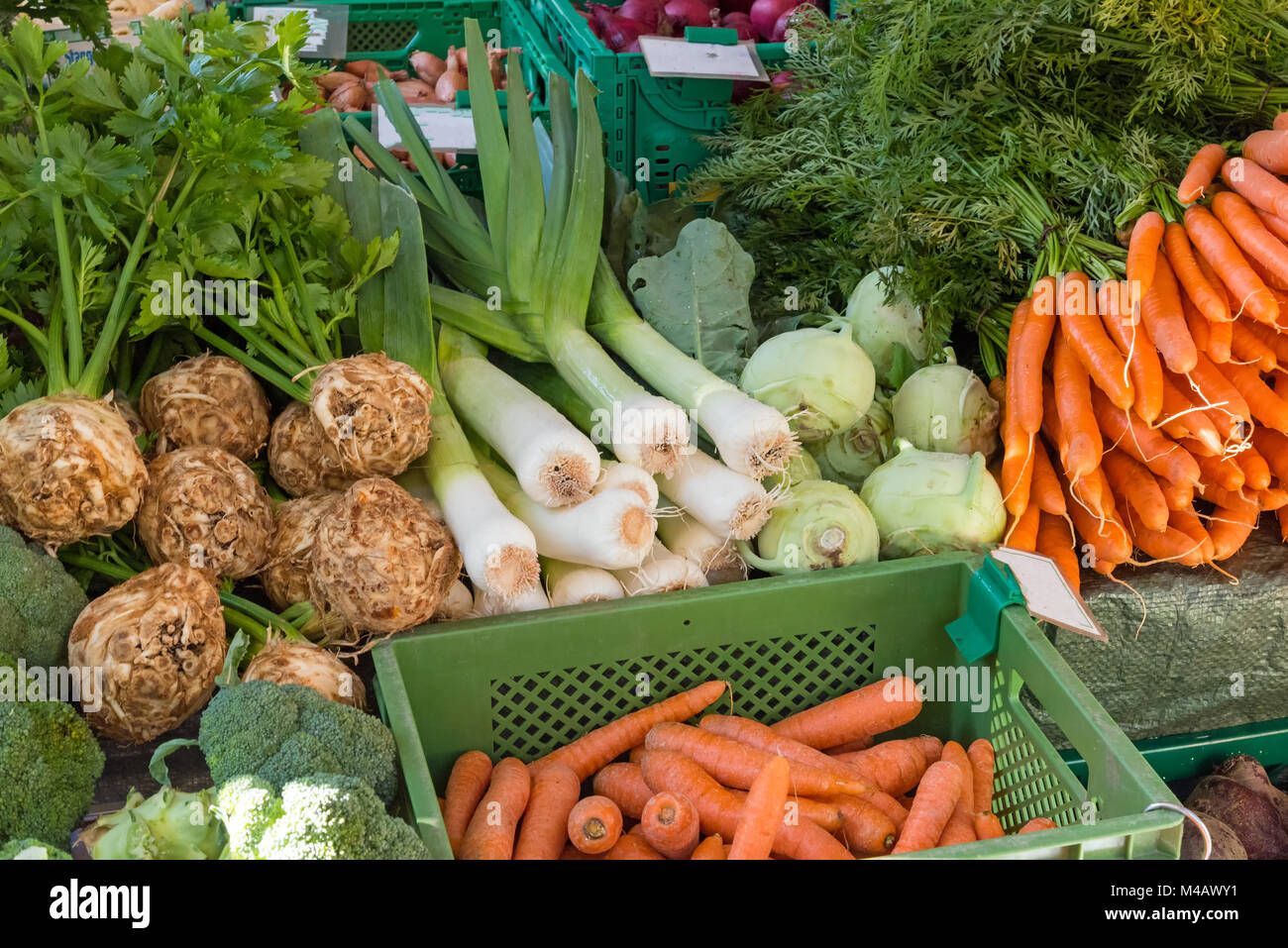 Fresh vegetables in boxes for sale at a market Stock Photo - Alamy
