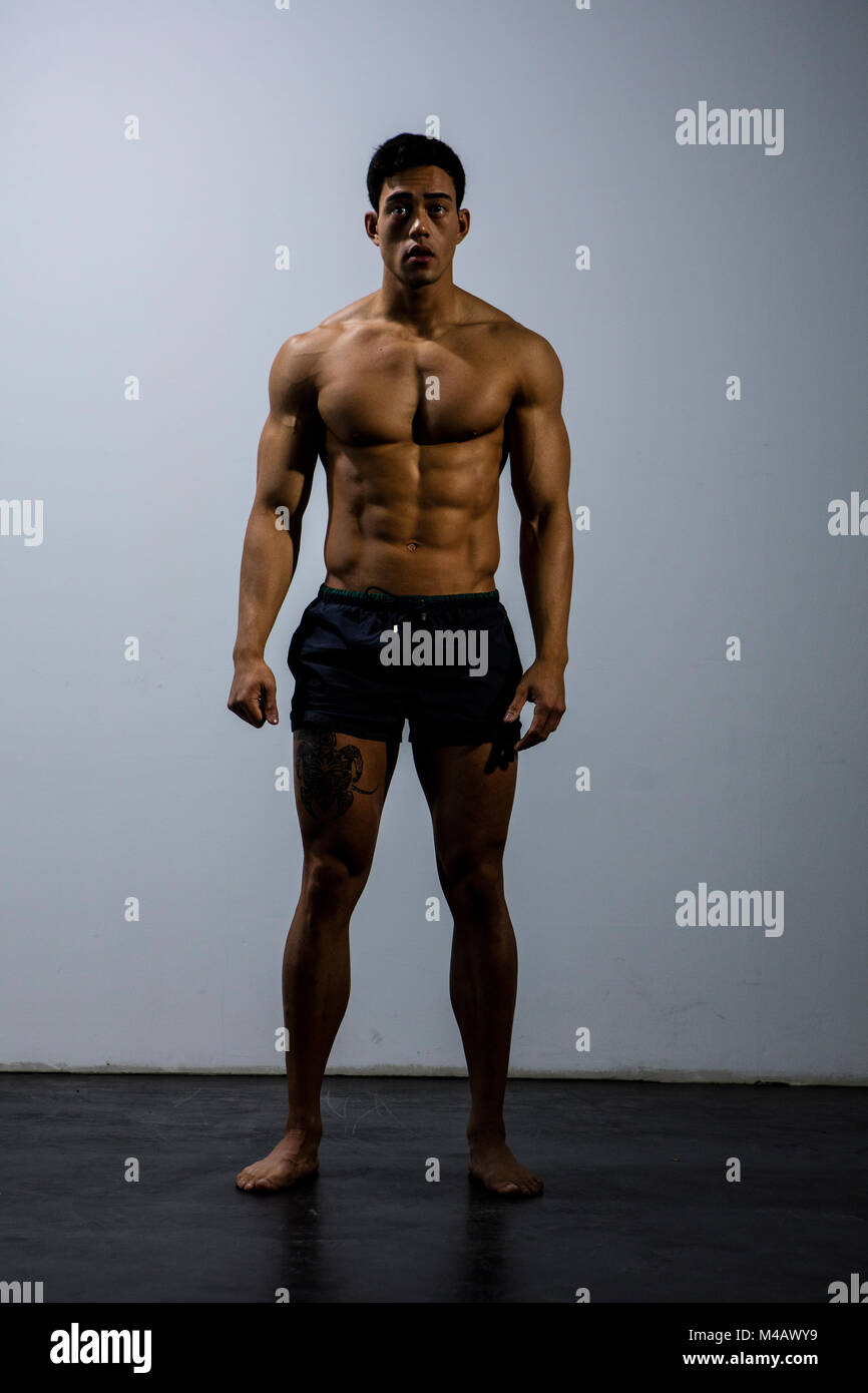 An Asian fitness model full body shot looking directly at the camera Stock  Photo - Alamy