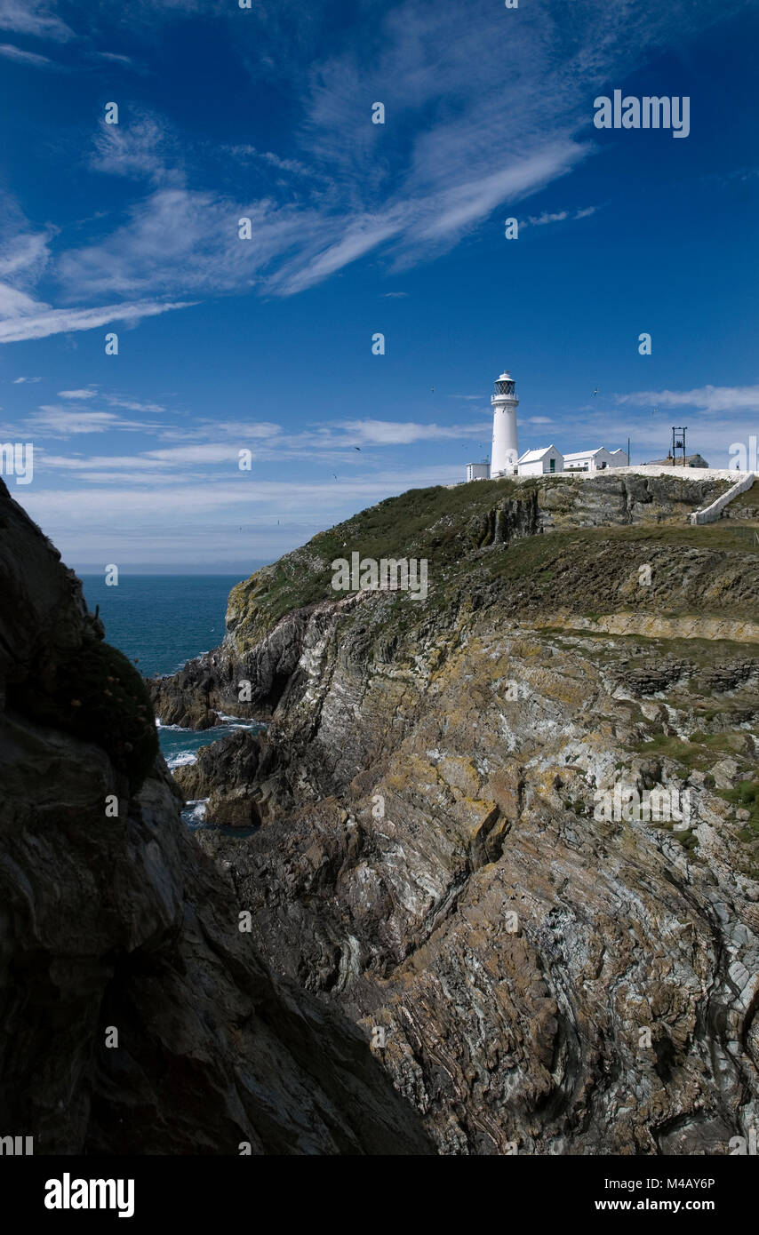 South Stack Lighthouse situated on the summit of a small island off the north-west coast of Holy island in the Isle of Anglesey. Stock Photo