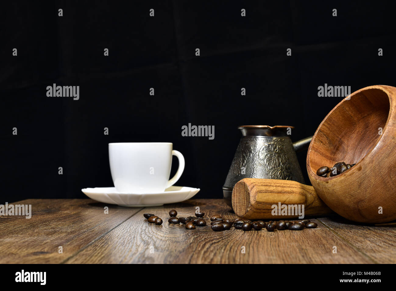 Cup of coffee, beans and mortar with pestle Stock Photo Alamy