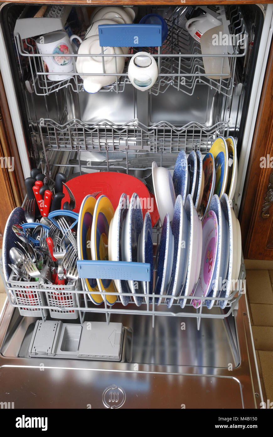 Dishwasher full of clean dishes Stock Photo Alamy