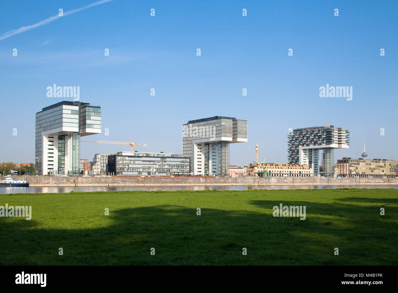 Urban development project in the old industrial harbour 'Rheinauhafen' at the river Rhine in Cologne, Germany Stock Photo