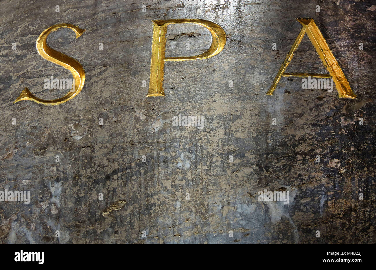 inscription SPA in golden letter,carved in stone,close up Stock Photo ...