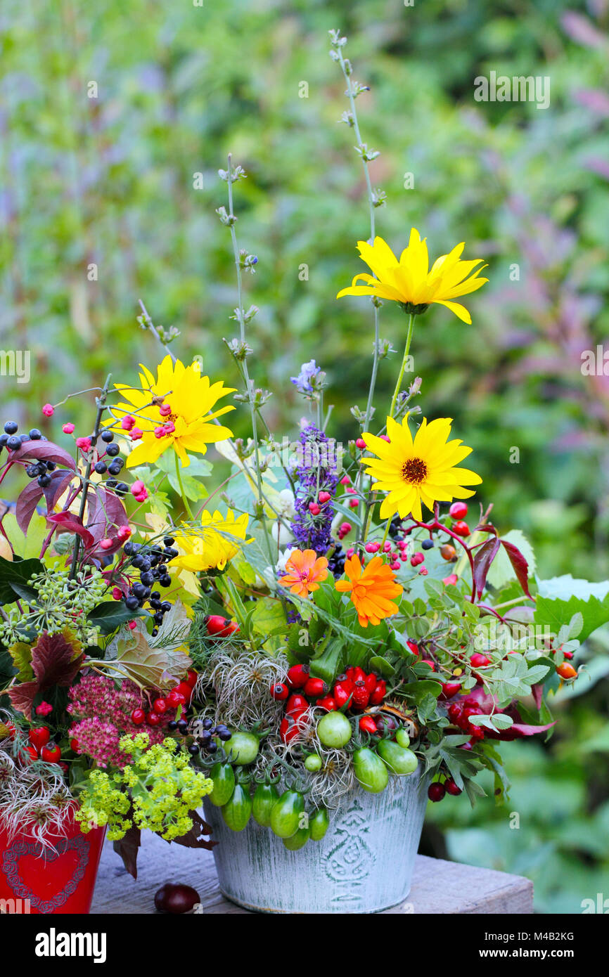 Autumn flower arrangement on garden table Stock Photo Alamy