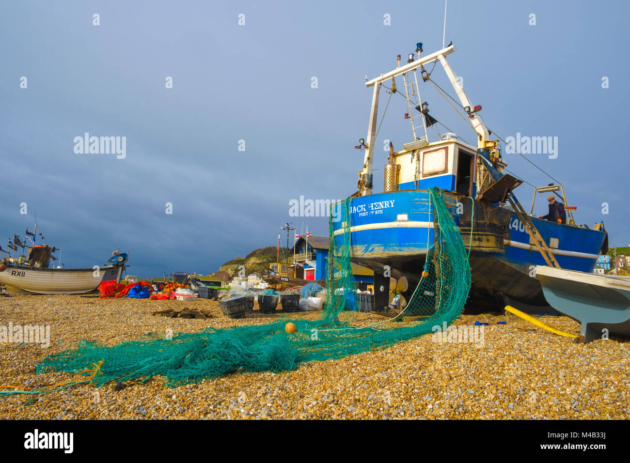 Fishing boat Jack Henry Hastings Old Town Stade Fishing Boat Beach  drying nets on a winter day Stock Photo