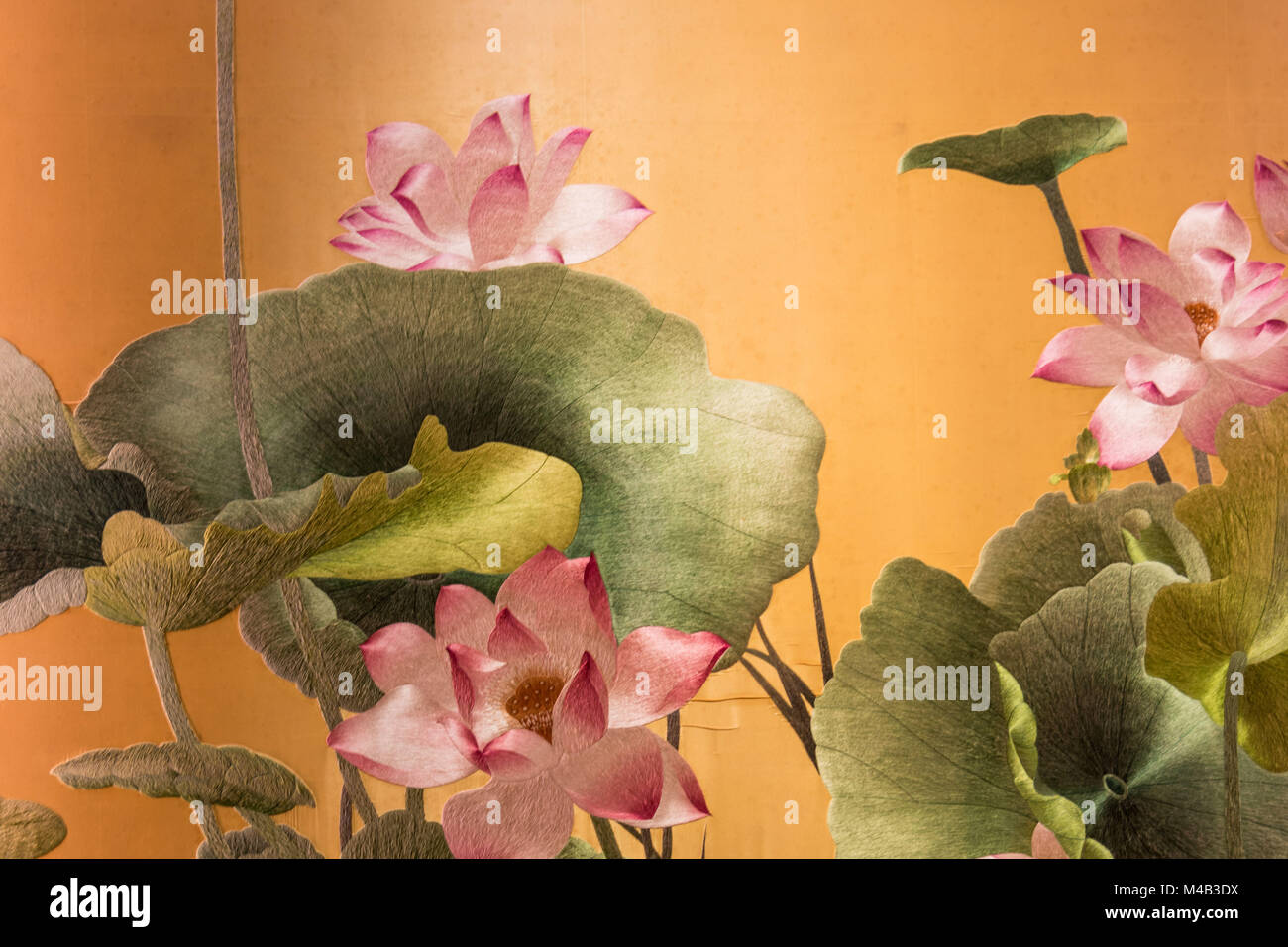 Embroidered wall decoration in the 'Buddha Tooth Relic Temple',a Buddhist temple in Chinatown in Singapore Stock Photo