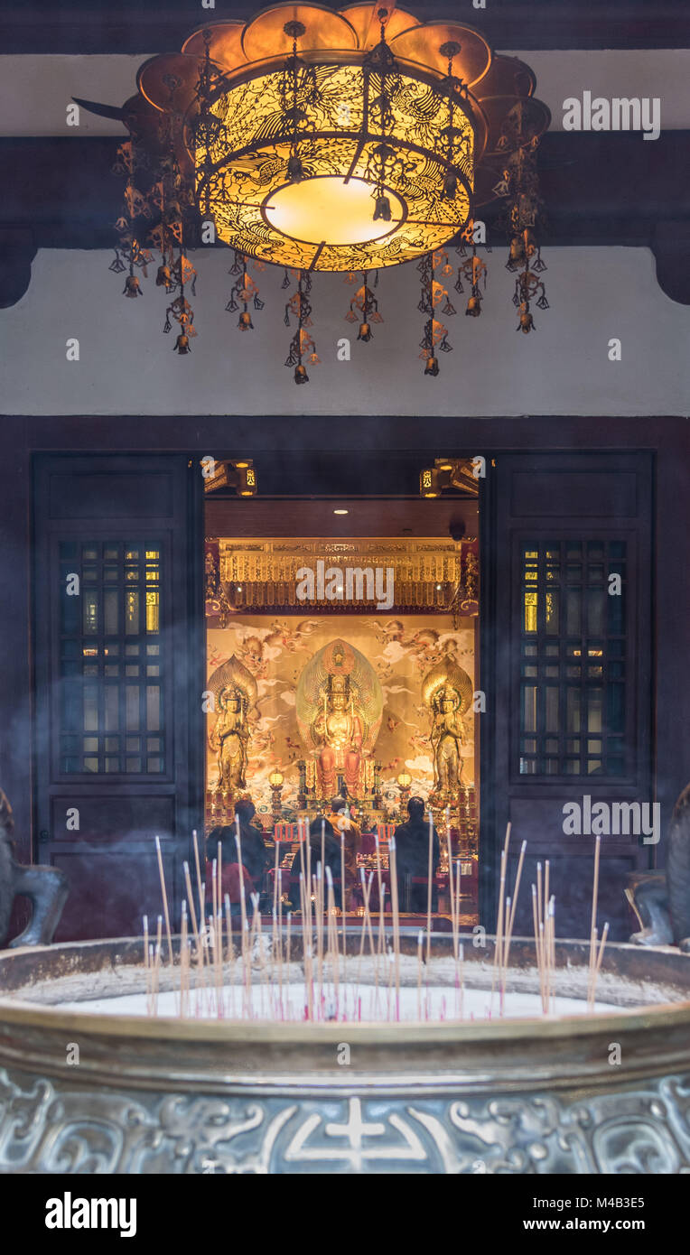 Joss sticks in front of a Buddhist temple in Singapore Stock Photo