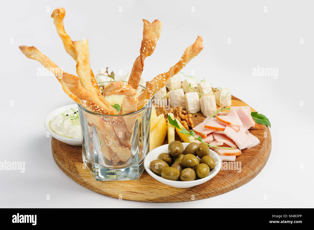 Assorted beer snack, cheeses, wallnuts and other Stock Photo
